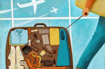 Physician pulling suitcase